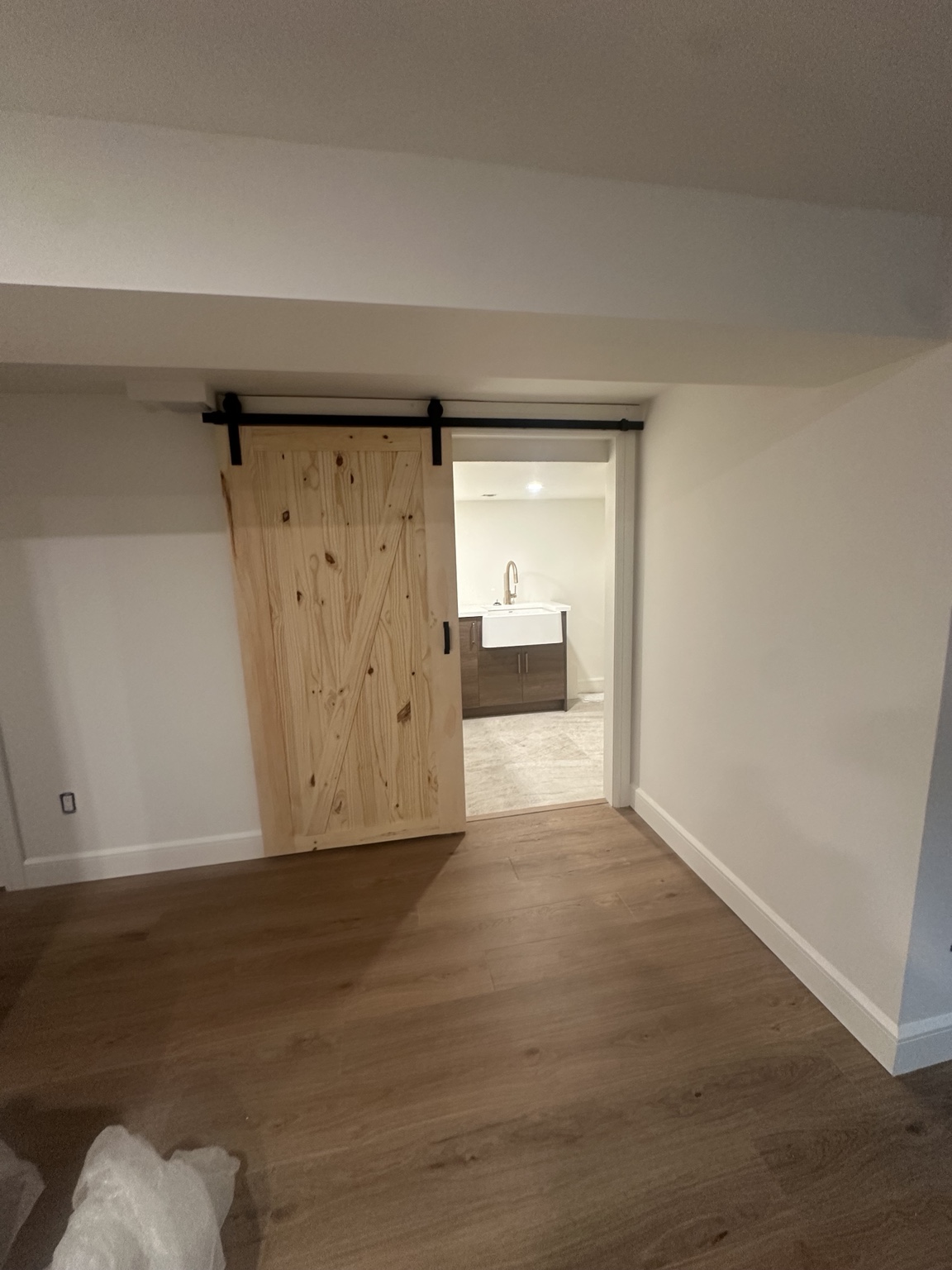 Interior barn door installation